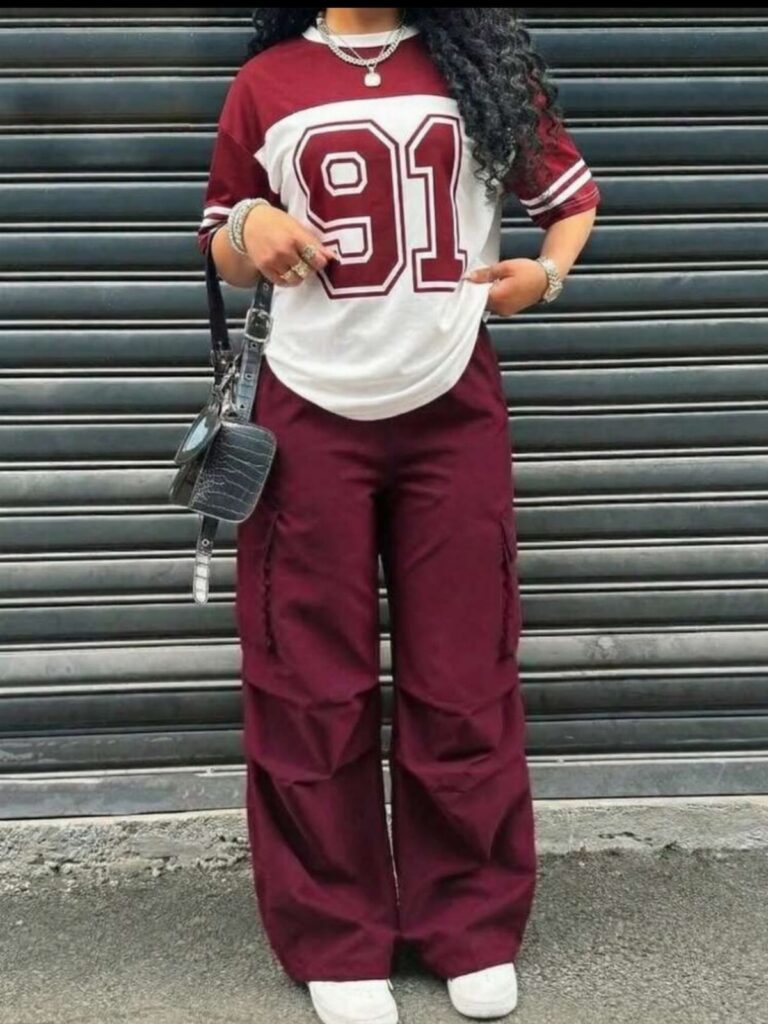 Person wearing a maroon and white jersey with number 91 and matching maroon cargo pants.