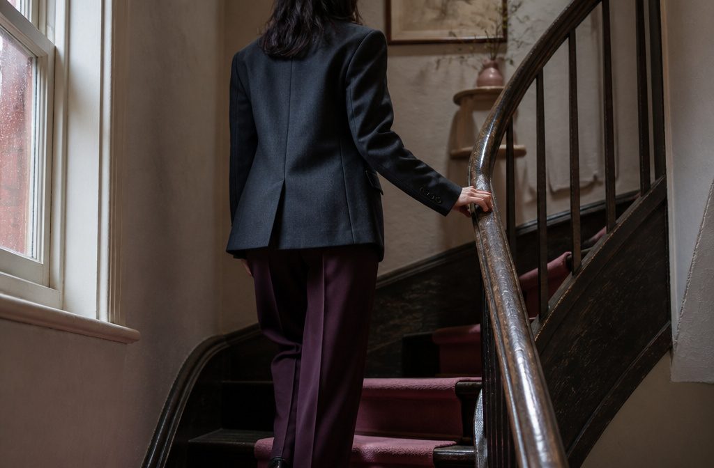 Petite woman wearing fashion designed for a shorter frame